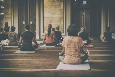 a yoga class from behind